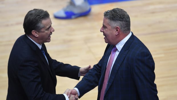 UK head coach John Calipari and Auburn head coach Bruce Pearl shake hands after the University of Kentucky basketball game against Auburn University at Rupp Arena in Lexington, KY on Saturday, February 29, 2020. Kentucky Basketball Auburn University